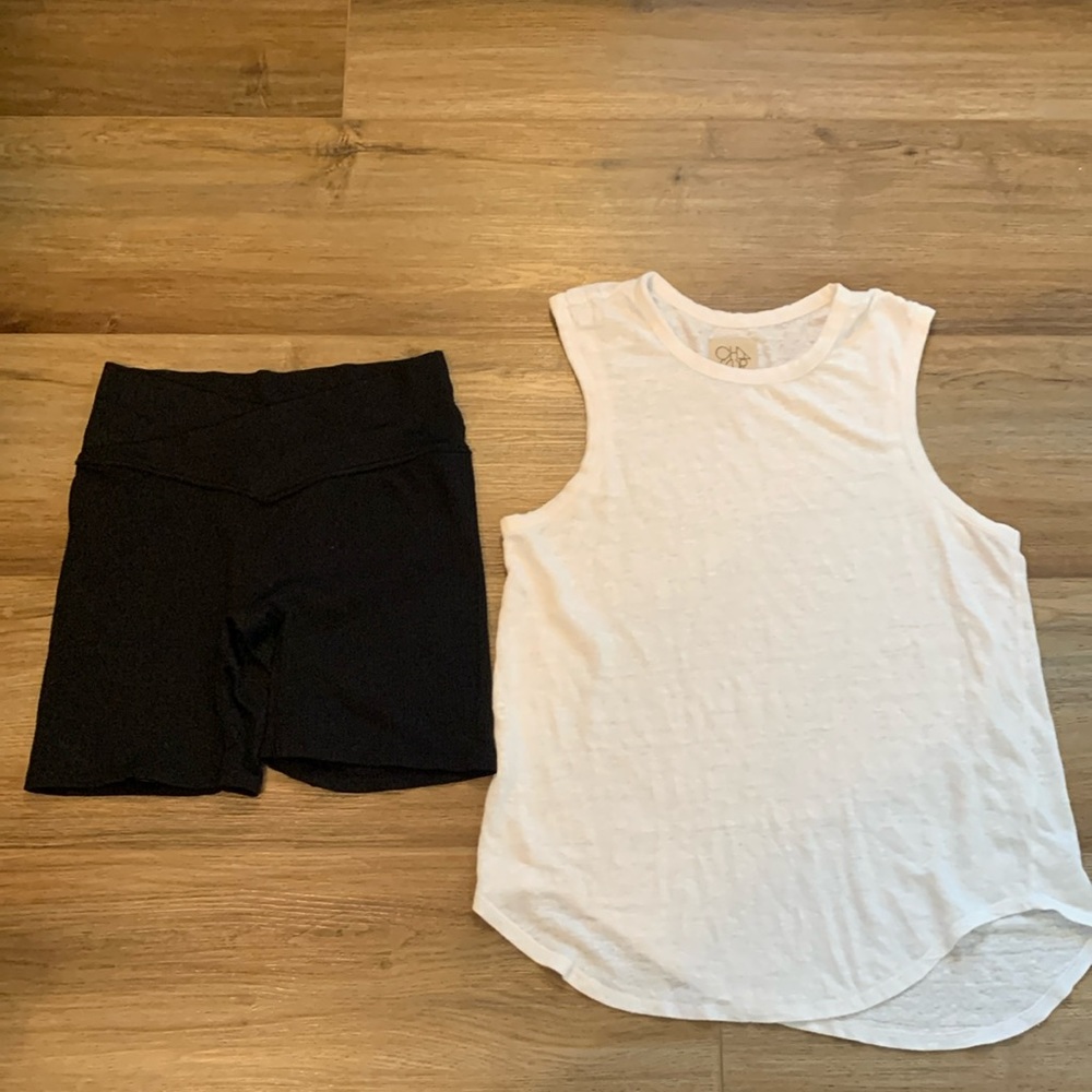 Workout black shorts by Colsir  & white tank top by Chaser both size Medium